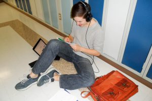 Student Working in the hallway